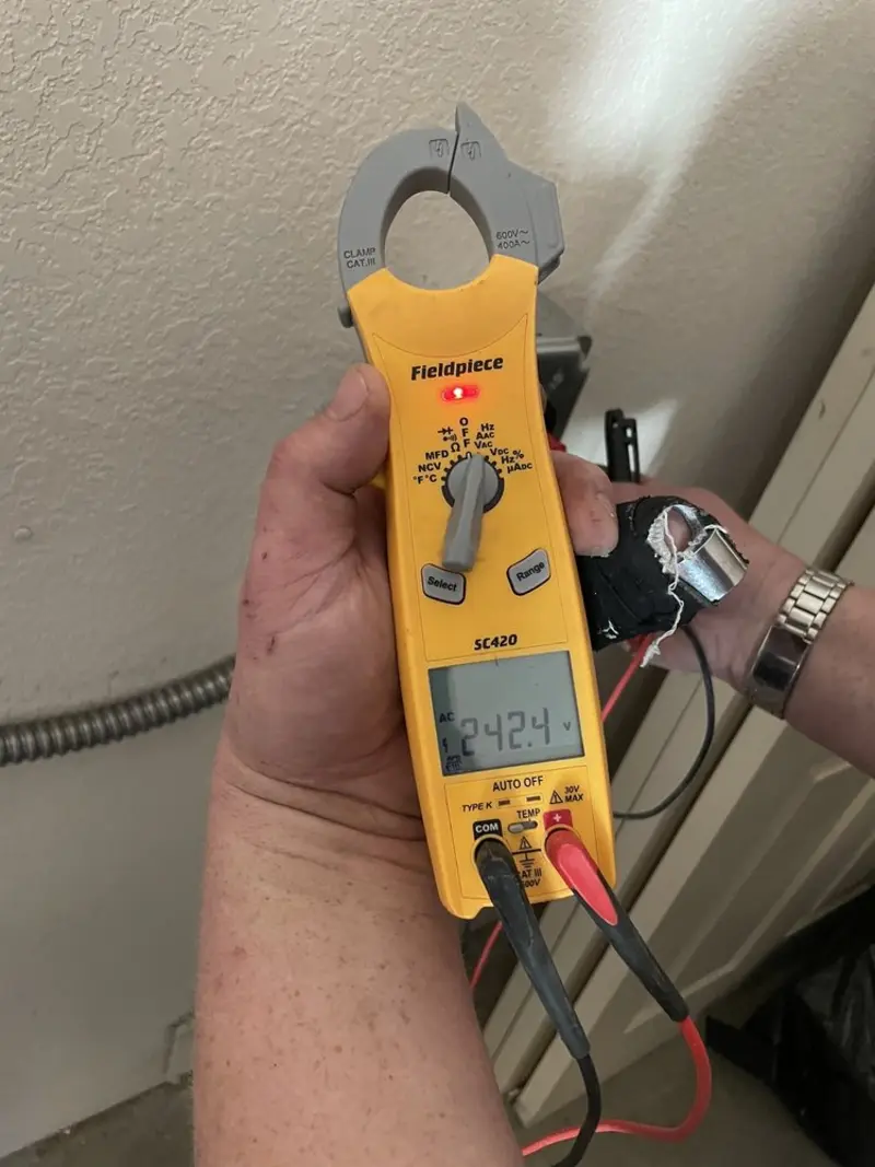 Voltage testing with clamp meter during Circuit Breaker Repair in Bruce
